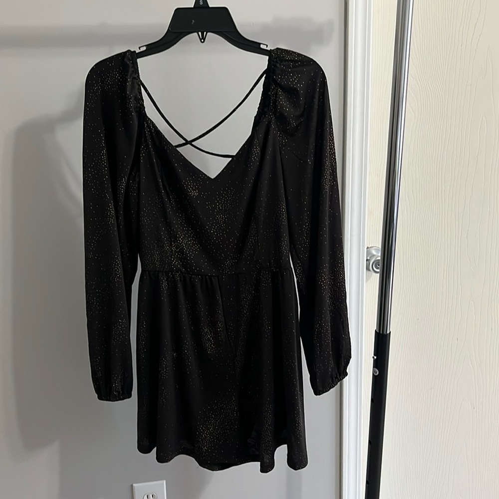 Black and gold accent long sleeve romper